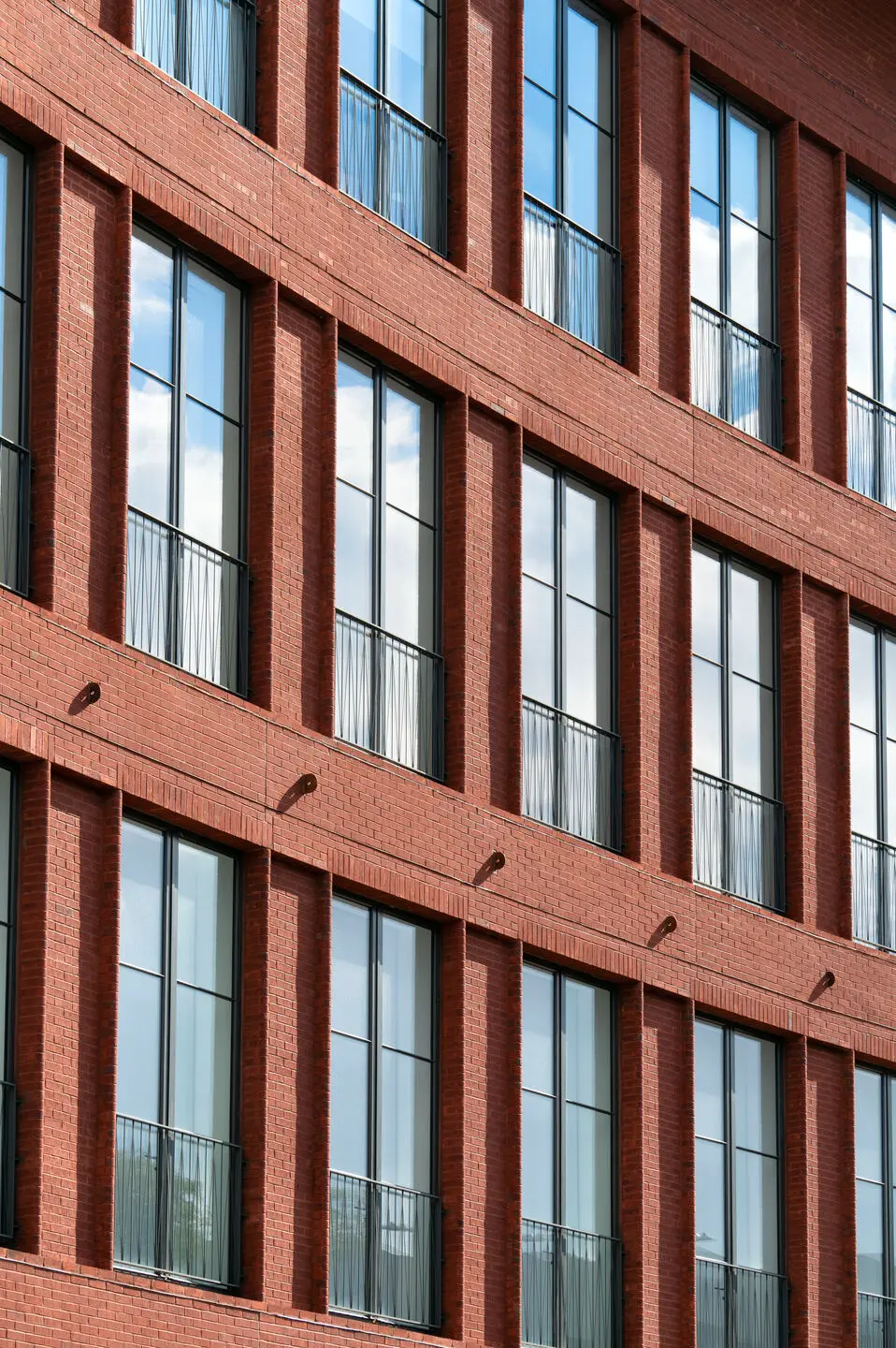 Thermal Stainless Steel casement window pairs with powder coat finish, SDL muntins, high performance insulating glass