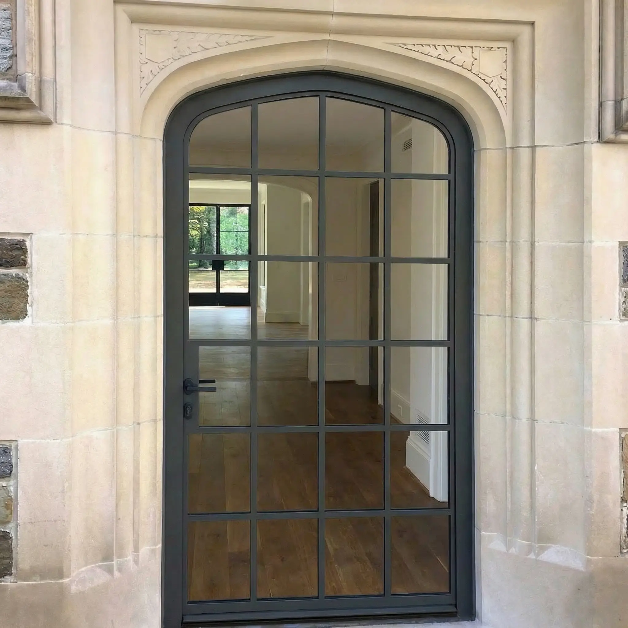 Thermal Stainless Steel Vestibule Entry door with powder coat finish, SDL muntins, high performance insulating glass