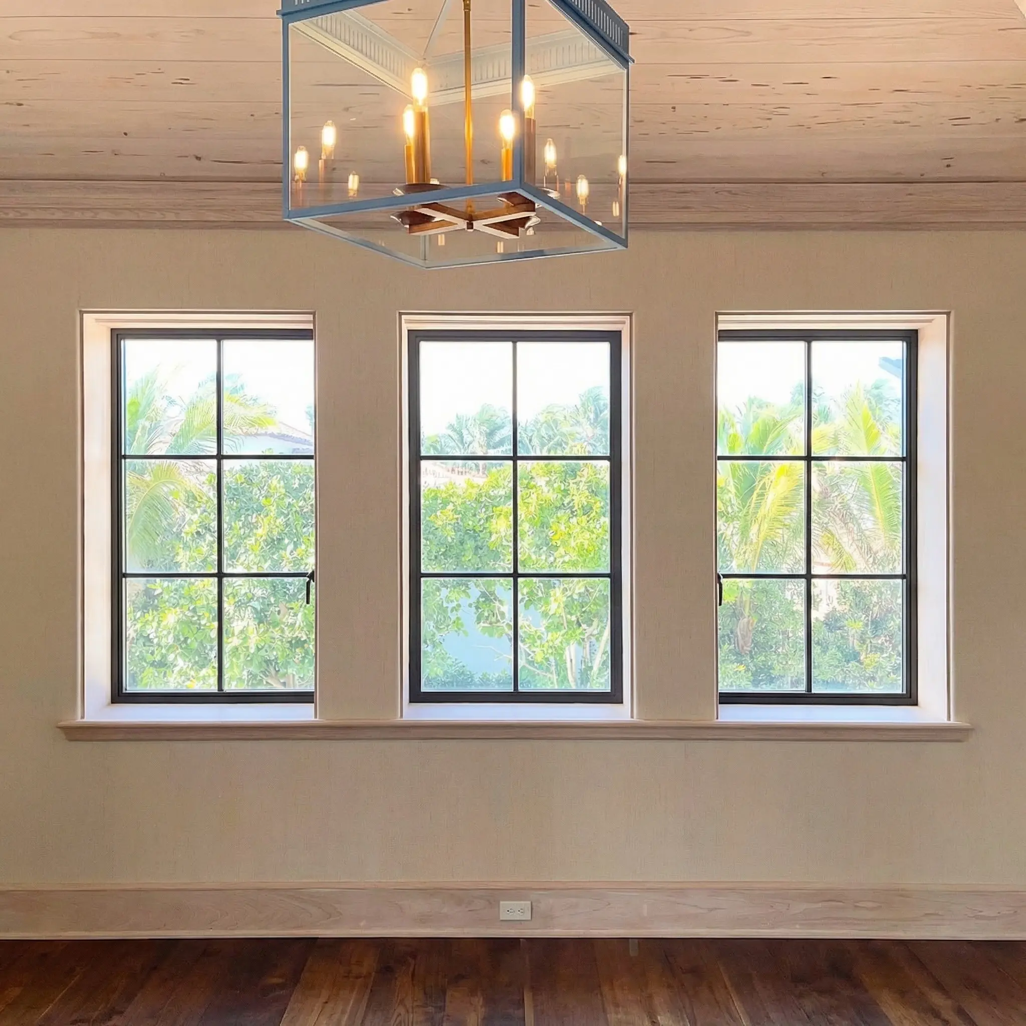 Thermal Stainless Steel casement windows with powder coat finish, SDL muntins, mullions, hurricane rated glazing
